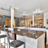 Large community kitchen with bar seating