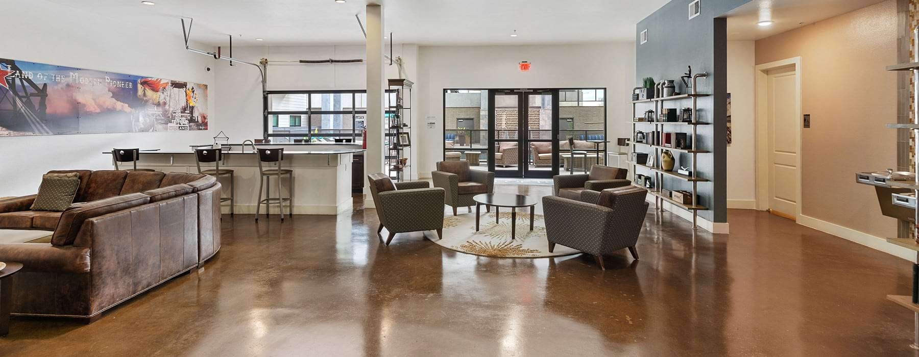 Spacious and well lit lounge with tile floors and plenty of seating 